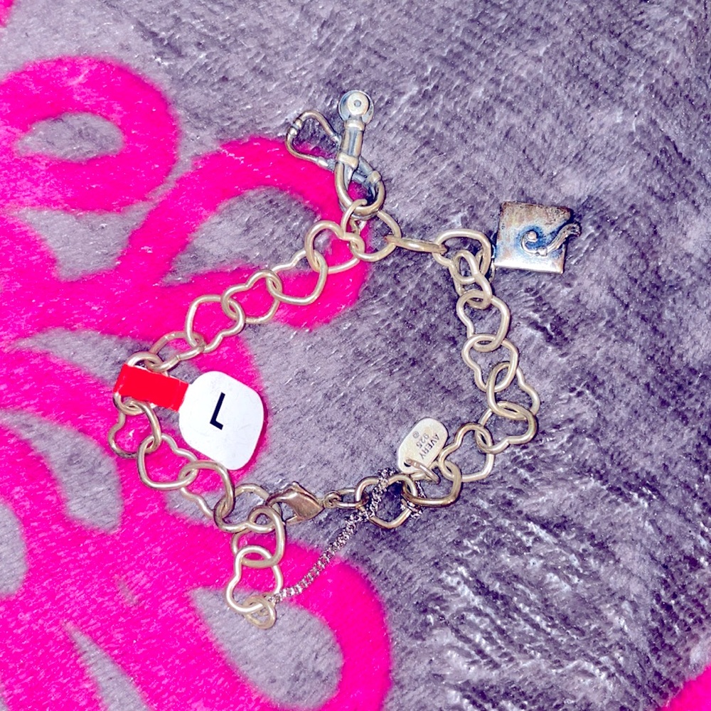 Large James Avery bracelet with stethoscope and cap and gown on it already